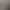 Zimmer mit einem Himmelbett und einem Tisch mit einem Stuhl neben einem offenen Fenster