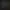 Stilisiertes Hauslogo in einem Kreis, durch eine Scheibe gesehen mit einem unscharfen Spiegelbild im Hintergrund